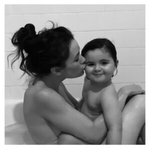Ashlynn Yennie Instagram - Birthday Bath Pic 🛁 Holy Wow, they say it goes fast and yes, yes it does. Every year I take a birthday bath with Viv to celebrate her coming into this world … this year we barely fit in our tiny tub together, when I said smile she stuck her tongue out and there were a lot of naked Barbies that joined us 😂💓👻🥹 #mygirl #birthdaybath #tradition #waterbirth #birthdaysuit #thisisfour