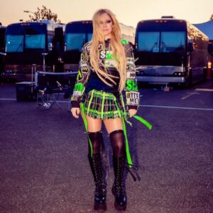 Ashton Michael Instagram - 💚🖤AVRIL🖤💚
.
@avrillavigne on tour for “Greatest hits tour” in custom Ashton Michael crust punk patch hoodie and plaid garter skirt . When we say custom . We mean just that . . . 
.

📸 @skylerbarberio 
.
.
.
#ashtonmichael #avrillavigne #punkprincess #greatesthitstour #punktsugicollection
