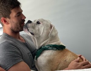 Austin Stowell Instagram - My sweet, big boy has said goodbye to this life. Gus was so much more to me than just my dog. He got me through the hardest parts of my life with his steadfast, unending love. My last words to him were, “I love you. Thank you for everything.” Those words do not even start to come close to showing my gratitude for the 11 years he spent with me. Gus sniffed the air deeply at the  scent of the ocean, the crisp air of the mountains, and whatever was cooking on the stove. He welcomed people at first sight with a hard lean and longing stare wanting to show his affection. He appreciated the value of good nap only known by the satisfied who have been worn out by the joys of life. He adventured with me from the Atlantic to the Pacific and everywhere in between. The beaches of The Gulf, the mountains of Canada, the sidewalks of New York, LA, Chicago, the deserts of New Mexico, the green peaks of Vermont, the slopes of Utah, and the the shores of New England at large. Gus was friend to all but I was always selfishly happy he chose me. So now it’s my turn to honor his life by loving hard, earning my naps, and taking the time to put my nose in the air and appreciate the simple gifts of life. I will love you forever and ever, Bubba. Until we meet again… 🐽 ❤️ 🐽