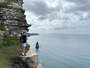 Banks Repeta Instagram - On the Cliffs of Moher in my @chubbies #chubbies#ireland #cliffsofmoher #explore #adventure #travel #skyhigh #earthsbeauty #banksrepeta #vans #chubbies