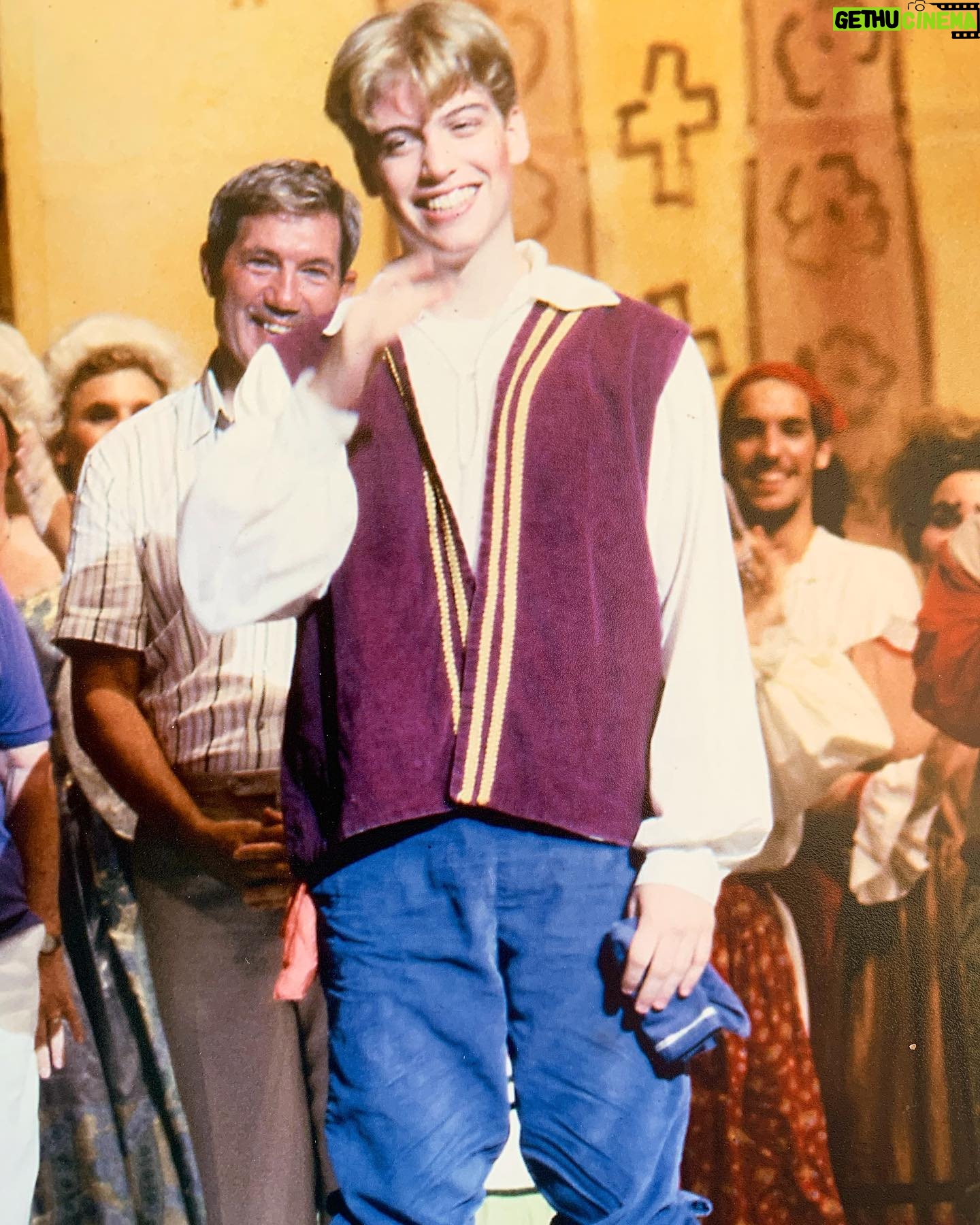 Barrett Foa - 6.3K Likes - I recently unearthed this pic of 17-year-old Barrett at the final performance of Interlochen Arts Camp’s High School Operetta production of Gilbert & Sullivan’s THE GONDOLIERS. I was never a lead in the Operettas, so this captured my disbelief and “awe-shucks-ness” at being awarded Most Outstanding Male Chorus Member OF THE LAST 25 YEARS. A slightly ridiculous if somewhat significant honor since the casts were huge. (I was chosen out of 1,000 guys.) (Looking back, I think they were just blinded by all that blush and my 90s center part. 💁🏼♂️ #goldenarches)
I always liked performing in middle school, but the four glorious high school summers I spent at Interlochen Arts Camp plunged me headfirst into the dynamic, transformative, unifying power of The Arts. It was there I grew from a 14-year-old boy who liked to play pretend to a 17-year-old artist utterly devoted to his craft. For eight weeks and four summers, I stood side by side with student artists from all over the globe at the very top of their craft - from classical cellists to jazz percussionists, modern dancers to pottery makers, creative writers to Shakespearean actors - I was constantly in awe and constantly inspired. It was pure magic.
Interlochen Public Radio recently interviewed me about my time at Interlochen, on Broadway, and on 11 seasons on NCIS: Los Angeles. The link to the article and radio interview are available in my bio.
The arts can, will, and must keep thriving. As a way to give back to an institution that gave me so much (including this preposterous award!), I established the Barrett Foa Endowed Scholarship in Theatre Arts. I return to Interlochen every few years to meet my scholarship students, teach master classes, and relive the magical memories hidden around every corner.
“Dedicated to the Promotion of World Friendship Though the Universal Language of the Arts”
#interlochenartscamp #interlochen #interlochencenterforthearts #summer #summercamp #arts #TheArts #theatre #theater #theatrekid #musicaltheatre #opertta #gilbertandsullivan #chorus #onetimeatbandcamp #thisonetimeatbandcamp
