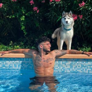 Bastien Muñez Instagram - Relaxed with son 🐶 ❤️ ! 
.
#dog #pool #summer #love