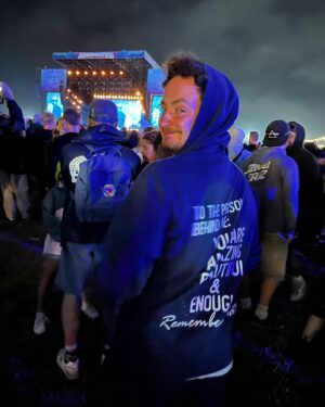 Ben Shephard Instagram - Meant to post this a few days ago. Was stood behind this guy at a festival over the weekend and his hoodie really struck me. We had a chat and I asked if I could take a pic @mr_nazariy was lovely, he’s from Ukraine and was really keen to share the message, so i am and you know what, you are enough ❤️ #festival #enough