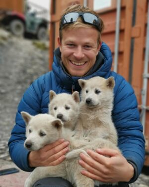 Bertie Gregory Instagram - We interrupt your regularly scheduled programming to bring you this breaking news: sled dog puppy party!  We bumped into these little ones while filming in the Canadian Arctic for a new secret project. The puppies are sadly not the filming subject. Photo by @ntgates, featuring @hollytarplee and @howardbourne #dogsofinstagram #puppy #puppyparty #puppylove #internationaldogday