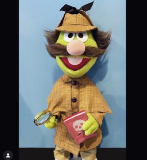 Billy Jensen Instagram - Thank you so much Emily for making and gifting me this amazing Sherlock Hemlock! 

Emily (@axepersonified) creates amazing Muppets replicas. She asked which one I would want, and I thought about the Newsman, Reporter Kermit, and of course, Super Grover. But in the end, she bestowed upon me Sesame Street’s original detective, Sherlock Hemlock. Perfect. 

Who’s your favorite muppet? 

The Muppets mean a lot to me. My mom and I used to watch the Muppet Show together every Monday night, and we later bonded over Emmet Otter when Dad was in the hospital over Christmas.
Sherlock was voiced by the great Jerry Nelson, who also was The Count, Lew Zealand (the most deranged muppet in history) and Emmet himself. 

In honor of Jim Henson and the new doc, and say to you all “Egad!” 

Please look at Emily’s page. She has made so many amazing characters. So many random ones. Taylor Swift as a Muppet and Crazy Harry are my two faves.