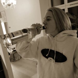 Björn Mosten Instagram - Just a beautiful actress enjoying her 1L bottle of 150$ vodka.
