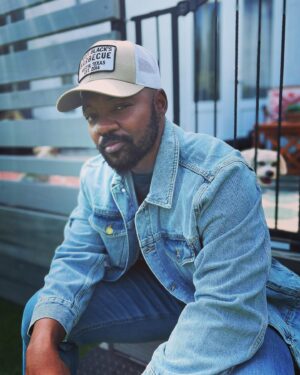 Brian Michael Smith Instagram - Even after all these years, September always feels like “back-to-school” time.

And as I slipped on this jacket today, I thought about how my back-to-school shopping experiences shaped my love/hate relationship with clothes.

I reminded how when I was a kid, everything was so either/or. There were either boy clothes or girl clothes without much in between.

I learned very early on that no matter how I saw myself, clothing dictated how people saw me. 

The designated colors and cartoons were pretty much billboard signs announcing your gender and telling all the other kids who you were and how to treat you.

Growing up clothing was used as a tool correct and undermine my masculine gender expression. 

Back to school shopping was a battle in which I experienced the pain and distress of being erased and overwritten when forced to wear clothes designed for feminine girls. But  later on, once I had the ability to pick my own clothes, I felt the power validation and euphoria of wearing clothes that matched my gender. 

I’ll never forget how much stronger and present in the world I felt when I wore clothes that affirmed my masculinity for the first time.

I’m also reminded of that long period of time  in which, I struggled with clothing that were the right gender but, didn’t fit my body. Either they didn’t sit on me right, or I felt like I was buying clothes to camouflage parts of myself, to hide. 

But now I’m living in a time where companies like @bothandapparel exist. 

Where I can find clothes that both affirm my identity and experience and fit my body.

Clothes that are made for my body, That don’t hide my body or erase who I am. 

This jacket made by a Trans clothing company in collaboration with Transmasc artist, @danielsea_
is the gift I’m rocking for my younger self. 

The reminder that I don’t have deny one part of myself to accept another. That we are and always will be Both/And. 

📸: @laith_ashley 
.
.
.
#representationmatters 
#transisbeautiful #bothand #