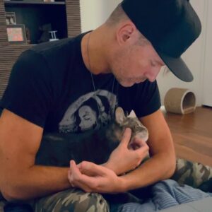 Brian Tyler Instagram - Rest in peace to our little boy PQT aka “Budgie.” 💔He made it till 15. But he had kidney failure which was only combatted by the angelic Herculean efforts of @sofie1111 with months of daily IV fluids and meds which kept him happy and alive. But sadly today his time was finally up. I love you PQ! You were the sweetest most loving most handsome boy with a heart of gold with a runway strut and expert comedic talents 🥰😢. Rest in peace buddy. ❤️❤️❤️❤️ you are suspended in a sunbeam ☀️