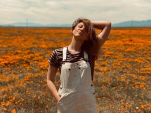 Brit Morgan Instagram - Drove to the poppies and enjoying some full deep breaths. Practicing allowing myself to fully land. In this moment, in my body, on the Earth. And grounding. If you’ve struggled with this then I’m reminding you- You are safe. And you matter. ♥️
