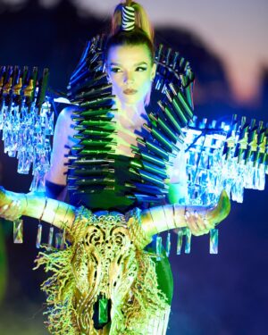 Brooke Bruk-Jackson Instagram - Tradition and Modernity

As we celebrate Africa Day, let us take this moment to consciously appreciate this piece that embodies the amalgamation of traditional African culture and modern Western elements. The merging of these two worlds creates a unique and captivating aesthetic, symbolizing the blending of past and present, tradition and modernity.

The chandelier shoulder piece together with the crystals on the cow head skull represent the glamour and innovation of Western culture, while the hut-thatched dress, iron spears, cow head skull and African war shields pay homage to Africa’s rich cultural heritage.

The use of traditional African materials, assorted with futuristic elements, celebrates the evolution of African culture and its ability to adapt and thrive in the modern world.

This Afrofuturist costume embodies the spirit of innovation and cultural fusion, honoring the legacy of African heritage while embracing the possibilities of the future. It is a testament to the spirited and ever-changing nature of African culture, pushing boundaries and redefining the fashion landscape.

In frame:- @brooke_brukjackson 
Photography :- @myownphotography.zim 
Make Up:- @realtouchzw 
Assistant Designer:- @hanzu_263 
Stylist:- @trixiedee11 

#africaday #zimbabwe #modernart #modernity #africa #fashioninafrica #fashion #runway #fashionmodel #africaday2024 #metgala #highendfashion #designer #avantgarde #avantgardemakeup #avantegardefashion