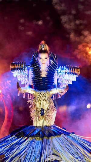 Brooke Bruk-Jackson Instagram - Tradition and Modernity

A piece that embodies the amalgamation of traditional African culture and modern Western elements. The merging of these two worlds creates a unique and captivating aesthetic, symbolizing the blending of past and present, tradition and modernity.

The chandelier shoulder piece together with the crystals on the cow head skull represent the glamour and innovation of Western culture, while the hut-thatched dress, iron spears, cow head skull and African war shields pay homage to Africa’s rich cultural heritage.

The use of traditional African materials, assorted with futuristic elements, celebrates the evolution of African culture and its ability to adapt and thrive in the modern world.

This Afrofuturist costume embodies the spirit of innovation and cultural fusion, honoring the legacy of African heritage while embracing the possibilities of the future. It is a testament to the spirited and ever-changing nature of African culture, pushing boundaries and redefining the fashion landscape.

In frame:- @brooke_brukjackson 
Videography:- @sammedopictures 
Make Up:- @realtouchzw 
Assistant Designer:- @hanzu_263 
Stylist:- @trixiedee11 

#africaday #zimbabwe #modernart #modernity #africa #fashioninafrica #fashion #runway #fashionmodel #africaday2024 #metgala #highendfashion #designer #avantgarde #avantgardemakeup #avantegardefashion #filmcostume #filmphotography #film #filmmaking #costumeforfilm