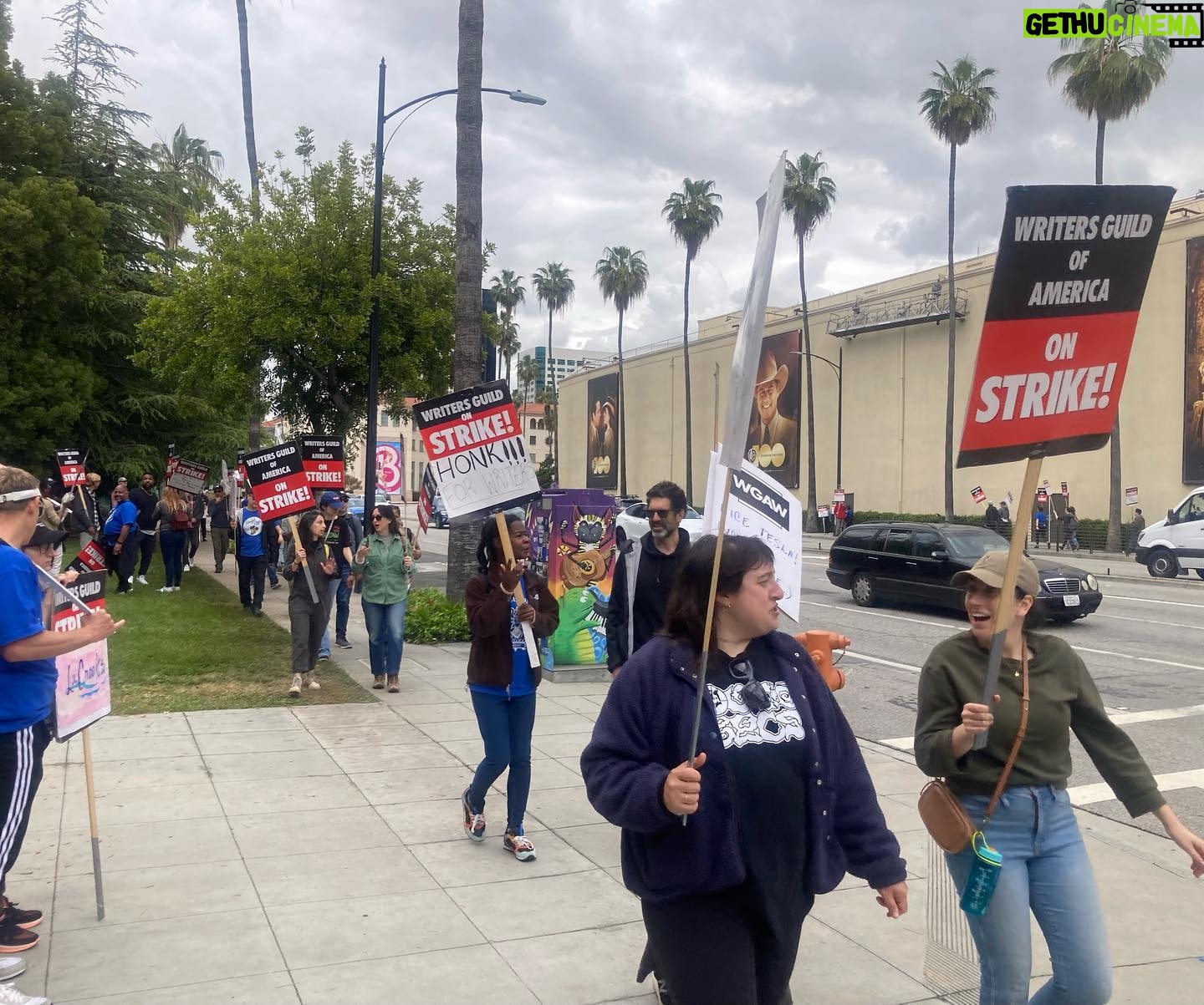 Brooke Smith - 1.8K Likes - @wgawest picket line today at WB… saw this guy with the lotion sign & had to get a shot with it! #tedlasso showed up to support, so did @_kismetcollective_ - they let protesters use their bathroom, gave out free water & coffee, and the guy on the motorcycle kept spirits up! @sagaftra