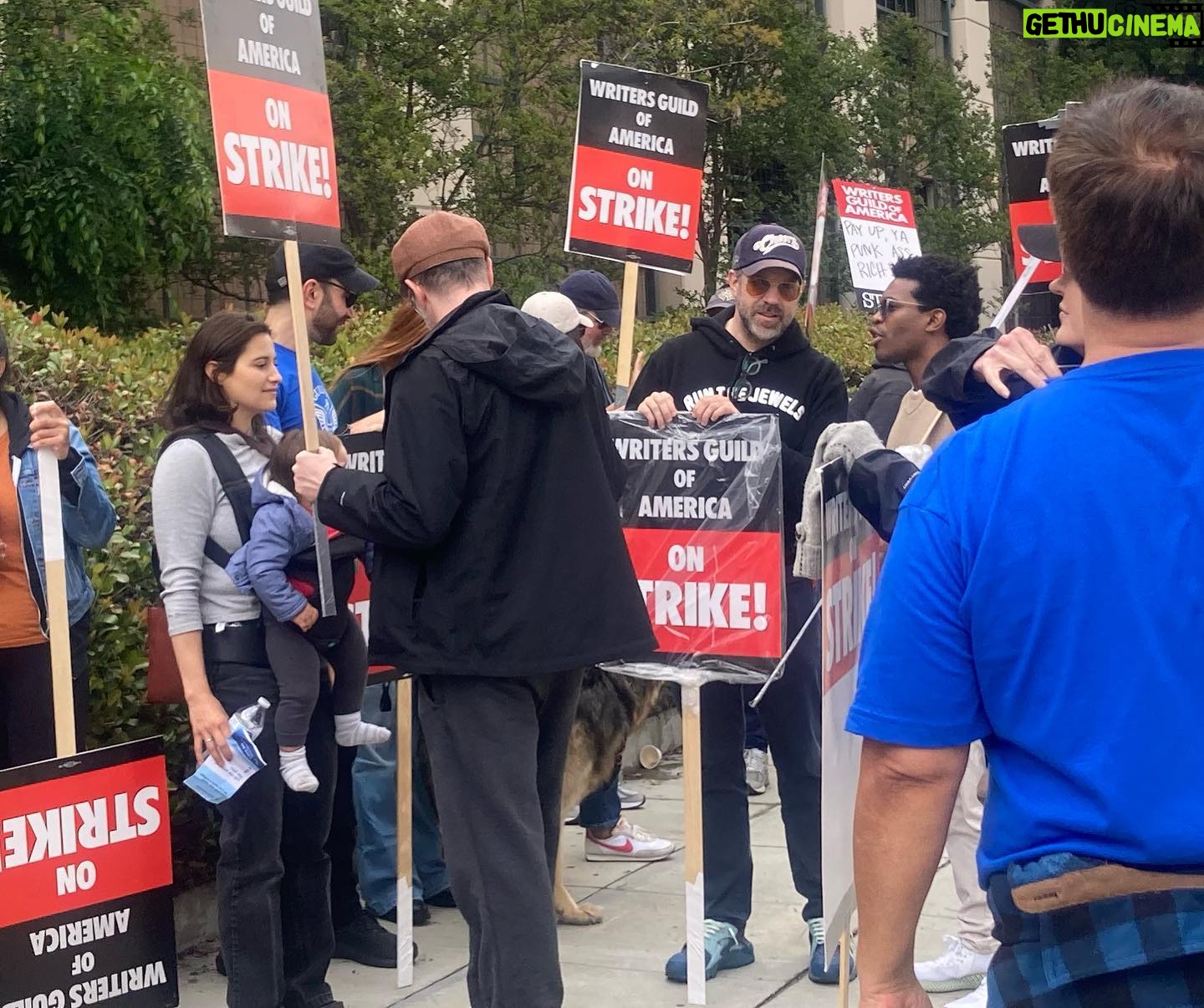 Brooke Smith - 1.8K Likes - @wgawest picket line today at WB… saw this guy with the lotion sign & had to get a shot with it! #tedlasso showed up to support, so did @_kismetcollective_ - they let protesters use their bathroom, gave out free water & coffee, and the guy on the motorcycle kept spirits up! @sagaftra