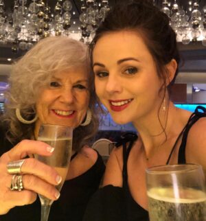 Brooke Williams Instagram - The most radiant beautiful queen holding small anxious jellyfish 😂. And not much has changed! Happy Mother’s Day Mum. You are the best human and I love you so much. Also, sheesh I have a lot of photos of us drinking. Thank you for putting up with me Mama. See you soon ❤️