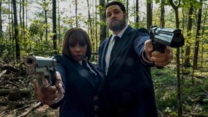 Cameron Britton Instagram - It takes two guns and Mary to make me look tough. Well, kinda tough. Well... not as nice as usual. #gunshow #donuts #gonuts #netflix #umbrellaacademy