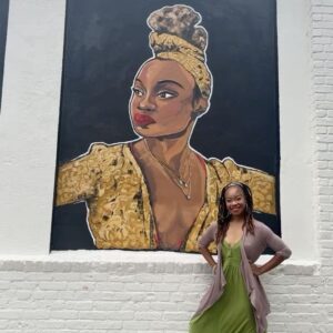 Camille A. Brown Instagram - I have always been proud to represent Southeast Jamaica, Queens, New York! “Queens is in da buildin!!!’” A very special thank you to  @jamaicaartscenter for including me in this series and for this massive acknowledgment! Many thanks to JCAL's Executive Director, Leonard Jacobs, JCAL's Artistic Director, Courtney Ffrench , NYC Parks Department Senior Public Art Coordinator, Elizabeth Masella, and Wendy A. Berot. Council Member, Nantasha Williams, District Leader and former Council Member, I. Daneek Miller, NYC Parks Queens Borough Commissioner, Michael Dockett

I am very honored to be on the wall with LL COOL J, Sweet Tee, Q-Tip, Jackie Robinson, Gregg Vance (Coach Chuck), Lani Guinier, W. E. B Du Bois, Naomi Osaka, and Count Basie! 

And shout out to the super talented artists who created the murals: 

Eric Black 
Justice Levenson 
Tyler Blau (LAG!) 
Nicole Wang 

Original pic by @josefinasantos 

Shout out to my family and dance family who came out to support! 

I was asked what was my hope when Black youth look at this mural. That all things are possible and to BELIEVE!!! There will always be challenges, but keep living your dreams, shoot for the universe, and be yourself in all spaces.

If you’re ever in Jamaica, Queens stop by Daniel O'Connell Playground and check out
#queensreflections 

Gratitude!