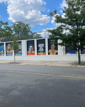 Camille A. Brown Instagram - I have always been proud to represent Southeast Jamaica, Queens, New York! “Queens is in da buildin!!!’” A very special thank you to  @jamaicaartscenter for including me in this series and for this massive acknowledgment! Many thanks to JCAL's Executive Director, Leonard Jacobs, JCAL's Artistic Director, Courtney Ffrench , NYC Parks Department Senior Public Art Coordinator, Elizabeth Masella, and Wendy A. Berot. Council Member, Nantasha Williams, District Leader and former Council Member, I. Daneek Miller, NYC Parks Queens Borough Commissioner, Michael Dockett

I am very honored to be on the wall with LL COOL J, Sweet Tee, Q-Tip, Jackie Robinson, Gregg Vance (Coach Chuck), Lani Guinier, W. E. B Du Bois, Naomi Osaka, and Count Basie! 

And shout out to the super talented artists who created the murals: 

Eric Black 
Justice Levenson 
Tyler Blau (LAG!) 
Nicole Wang 

Original pic by @josefinasantos 

Shout out to my family and dance family who came out to support! 

I was asked what was my hope when Black youth look at this mural. That all things are possible and to BELIEVE!!! There will always be challenges, but keep living your dreams, shoot for the universe, and be yourself in all spaces.

If you’re ever in Jamaica, Queens stop by Daniel O'Connell Playground and check out
#queensreflections 

Gratitude!