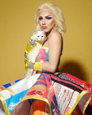 Captivating Katkat Instagram - The world will be better if we had the ability to love as unconditionally as our pets.
Its National Pet Day, lets show some love to our fur babies 🐾🐈‍⬛🐱🐩🐶

Wearing recycled cat/dog food sacks
Gown created @robertmg
Hair @francinehairextension
Assisted @captivateamkatkat 
Photography @jagger_studios 
🐈 Elsa
🐈‍⬛ Panther