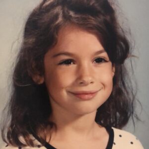 Cara Santa Maria Instagram - It’s September and I haven’t posted anything in a hot minute. So here’s a photo my mom brought when she visited from Texas this past weekend. That little girl looks like she’s up to no good. #SchoolPortrait
