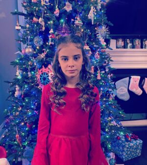 Carina Battrick Instagram - Christmas is surrounded by love, joy, and hope. Pass along this message to everyone to spread the light of this wonderful holiday.

#holiday #sisters  #christmastree #model #ralphlauren #happyholidays  #adorable #cutenessoverload #igkids #fashion #holidayfashion #style #stylishtrends #stylekids #pattern #red #brunette #blondehair #styletrends #fashionkids #kidsholiday  #stripes #santa #gifts #happyholidays #christmas2022 #holidaymagic #love #sisterlove #christmasdress #christmas