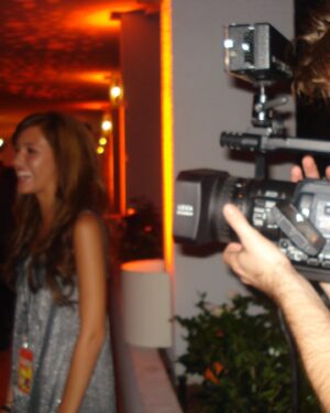 Cassie DiLaura Instagram - where it all began 💫 in 2008, I won a sweepstakes from @mtv and @sunkistsoda. I was 15 years old and flown to LA to attend the “mtv sunkist orange nation party” with @kimkardashian @khloekardashian @kourtneykardash & DJ @petewentz. (the “orange nation” of it all becomes important, keep reading 🥲)

I remember it so vividly.. looking at the actual bright lights of hollywood from the rooftop of @thelondonweho thinking, “I have to be a part of this.” I just didn’t know the ‘how’ or ‘what’ yet. I contemplated event planning… no? public relations…no? journalism sounded like me. I like talking 😂

it was my junior year of high school, so it was time to figure out what college I’d need to go to now to make it happen. I applied to the top 5 journalism programs in the country and wound up at my #1 choice… @newhousesu at @syracuseu.

ya know, syracuse is referred to as “orange nation”. I went there from 2011-2015.  what are the odds I won a sweepstakes 3 years prior that would determine my life path and it was called the “orange nation party”? I just put two and two together this week and it brought me to tears. it’s not a coincidence. God has been planting the seeds and giving me signs from the very beginning and continues to do so every step of my journey. even when we don’t know what’s next or how to get there… He does. 🙏🏼

📸:
⭐️ 15-year- old me w/ @kimkardashian & @kourtneykardash 🤍 @khloekardashian was nearby and missed the photo, but I remember all 3 sisters being so kind in our 20 second elevator ride together LOL. I have yet to interview them by the way.
⭐️ mtv followed me around with a camera that weekend to document my experience, which lives on a dvd somewhere in my childhood home. (@ mom can you find it?) 
⭐️ my first credential 🤩
⭐️ hot mic! me totally geeking out that I was wearing a mic pack while filming. I felt so cool. 
⭐️ hollywood ♥️
⭐️ the sweepstakes 🫶
⭐️ obviously I submitted the picture to all the tabloid magazines to be featured in their “star sightings” 😂

#kimkardashian #khloekardashian #kourtneykardashian #mtv #sweepstakes #career #journalism #syracuse #inspiration #newhouseschool #careerjourney #story #redcarpet #tv #correspondent