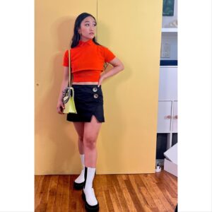 Cathy Ang Instagram - Last weekend with my boo and #netaporter for #nyfw 😘 Photo by @zevst , then some bonus shenanigans… 
.
Styled by @meg_galvin 
💄: @ayatariqmua
💇🏻‍♀️: @japanese_michael 
Top & skirt by #meryllrogge 
Boots by #charleskeithofficial 
Purse by #massimoboninishowroom 
Earrings by #lelesadoughi 
Inspired by #scoobydoo 🐶 
#velma #daphne