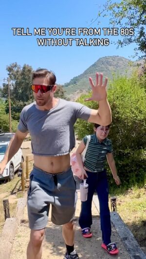 Chadd Smith Instagram - Accidentally put on my wife’s crop top at the campsite and thought I was in the Electro Rock crew from Breakin for a minute 🦾😎🔊 kid wasn’t having it 🤣 @icet #popntaco #breakin #turbo #ozone #boogalooshrimp #shabbadoo #poppin #robot #animationdance #electrorock