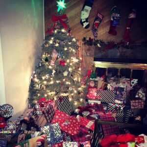 Charity Shea Instagram - I triple dog dare you to count all the presents....... Big family, lots of love, lots of Joy, lots of peace.  #HappyHolidays #ChristmasEvenight #magic