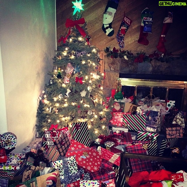 Charity Shea - 404 Likes - I triple dog dare you to count all the presents....... Big family, lots of love, lots of Joy, lots of peace.  #HappyHolidays #ChristmasEvenight #magic