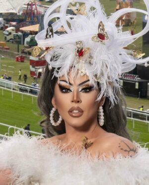 Cherry Valentine Instagram - AD | White and gold for a fabulous day down @epsomdownsracecourse for the #CazooDerby! An honour to be the FIRST drag judge ever for The Style Awards! 💕