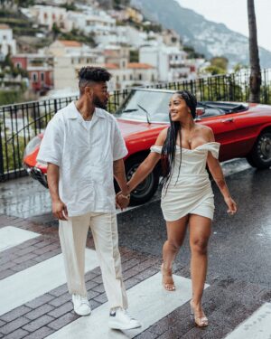 Cheryl Des Vignes Instagram - Saying some player shit to a girl I always wanted 🏁

Two weeks in Italy at the beginning of May also marks 1 year of our engagement. Decided we couldn’t go to a place as beautiful as the Amalfi Coast and not celebrate by finally taking engagement photos. Somehow we got down to these 10, but we’ve been staring at all 90 since we got them back lol. Maybe we’ll go through them all on YouTube 🤔

📸: @amalfitana_photographer 
🏎️: @spiderlifestyle