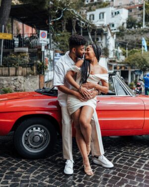 Cheryl Des Vignes Instagram - Saying some player shit to a girl I always wanted 🏁

Two weeks in Italy at the beginning of May also marks 1 year of our engagement. Decided we couldn’t go to a place as beautiful as the Amalfi Coast and not celebrate by finally taking engagement photos. Somehow we got down to these 10, but we’ve been staring at all 90 since we got them back lol. Maybe we’ll go through them all on YouTube 🤔

📸: @amalfitana_photographer 
🏎️: @spiderlifestyle
