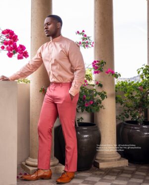 Chido Nwokocha Instagram - Waiting by the 🌺…
.
.
.
📸 @dimitryl 
👔 @amiaserrano 
🪞 @missvalnoble 
📰 @regardmag 
.
#prettyinpink #mensfashion #blooming