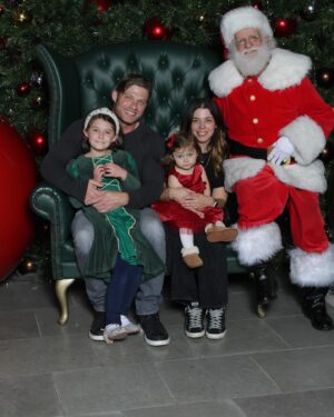 Chris Carmack Instagram - We met the big man! And had some big feelings about it… 

Merry Christmas to all! 🎅🏼 

@erinslaver 

#santascaries #meetingthebigman #familychristmas2023 #santababy🎅🏼