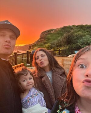 Chris Carmack Instagram - Family life lately… swipe ⬅️
@erinslaver 

*we took a trip to the ocean recently and everyone’s favorite part of the day was to watch these magnificent sunsets

*Kai ❤️

*it rained most of the time we were there but that gave us this double rainbow 

*we didn’t know we needed a pet seal until we met this guy 

*in our influencer era 😂

#familytripspring2024 #sunsetsandocean #doublerainbow🌈🌈