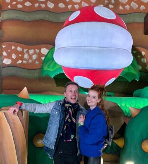 Chris Hardwick Instagram - It’s-a-us! Thank you @nintendoamerica & @unistudios!!! Going to the opening of #SuperNintendoWorld #AtUniversal last week was a lifelong gaming dream come true. It’s fully immersive and really does feel like you’re in a Mario game. There is a great AR Mario Kart ride, a bunch of mini games that interact with your power up band, and a themed restaurant with yummy food. @lydiahearst & I had the bestest bestest time!