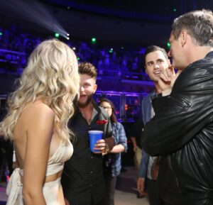 Chris Lane Instagram - The year was 2016..just had my first song on the radio..I was playing the @iheartcountry festival in Austin Texas… i didn’t know it at the time but @tompoleman introduced me to my future wife that night. 4 years after meeting / this photo we were dating and then engaged. Yesterday-8 years later I played the festival for my second time and we got to reminisce on that night and I got to personally Thank Tom for that introduction on April 30 2016
-by the way who let me wear my hair that high 😩🤦‍♂️