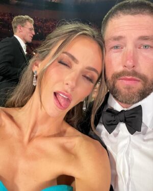 Chris Lane Instagram - Mom & Dad date night at the @cma

Stylist - @kristaroser
Assitant - @clairetjohnson 
LL Tailor - @stefanienaylor
CL Tailor -  @jbcustomtailoring
Suit   Cufflinks - @michaelandrewsbespoke
Shoes - @aldo_shoes 
Bowtie - @brooksbrothers 
Watch - @rolex
Gown - @zacposen / @janetmandell
Heels - @paulandrew 
Bag - @jeffreylevinson 
Earrings - @kingjewelers