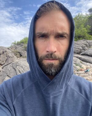 Chris Sharma Instagram - Welcoming in the fall temps, and happy to have my cozy @prana hoodie after a solid session climbing and falling into the sea in Mallorca.
Thanks for the great shots 📸@honngy 
#pranaadventurer