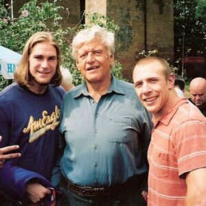 Chris Spradlin Instagram - Since the other photo is making the yearly rounds again I thought I would share this one as well. This was taken at the 14th Annual Wrestlers’ Reunion, August 13, 2006 in Kent at Wayne Bridges’ pub. We had the privilege to meet and mingle with dozens of British wrestling legends like Mark Rocco, Jim Breaks, Steve Grey, and Pete Roberts. Nigel McGuinness should have been with us here but he was banged up, quite literally, from the ROH Unified show the night prior in Liverpool. Who can name the gentleman in the middle?
