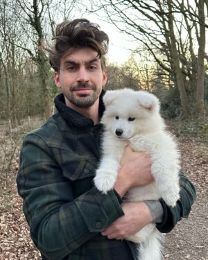 Chris Taylor Instagram - Fellow humans…This is my son, Socks 🐶 & looking at photo 5 & 6 he’s had enough of my sh!t already. Strong side eye 🤨

Hobbies include sh!tting wherever he damn pleases & barking at me when I sh!t (he’s fairly unreasonable). His favourite food is 48 month matured doormats & pop socks. Loves a power nap & wants to be a professional cloud when he grows up. Thought I’d introduce ya… 

Officially a daddy now so lock up your great aunties sisters