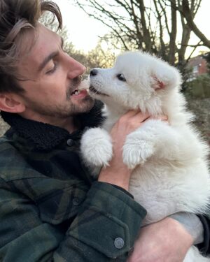 Chris Taylor Instagram - Fellow humans…This is my son, Socks 🐶 & looking at photo 5 & 6 he’s had enough of my sh!t already. Strong side eye 🤨

Hobbies include sh!tting wherever he damn pleases & barking at me when I sh!t (he’s fairly unreasonable). His favourite food is 48 month matured doormats & pop socks. Loves a power nap & wants to be a professional cloud when he grows up. Thought I’d introduce ya… 

Officially a daddy now so lock up your great aunties sisters