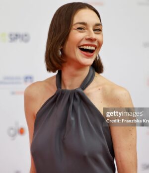 Christiane Paul Instagram - What a great evening! Thanks for having me @paramount_pictures_germany ! @deutscher_filmball @bayrischerhof 
#specialthanks to #vincentdelatour @peterschulzefilm 
.
.
.
#dress by @michaelsontagatelier #shoes @prada #jewelery @bulgari #styled by @andreaspeterkrings #glam by @philippverheyen #glamassistant @tillzettl 
.
. Pic 2: 
@gettyimages / Franziska Krug