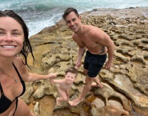 Christie Whelan Browne Instagram - Do not EVER underestimate a dip in the ocean, building sandcastles, collecting shells, a new pair of crocs, learning to swim, cuddles in a towel, catching crabs and long summer nights. They can heal the soul. 🩷