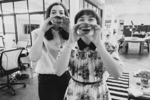 Christina Scherer Instagram - More fun facts, because why not?! I also am assuming most of you follow me because you’ve seen “The Intern” so here is a throw back to one of my favorite pictures of Annie and me. 

1. I can speak gibberish. This is a real thing, if you know…you know.
2. I decided I wanted to be an actress when I was three years old. I remember the exact moment and I’ve never looked back. 
3. I love musicals. My favorite is “Once,” I think I’ve listened to that album an embarrassing amount of times. It ends up on my Spotify wrapped EVERY year. 
4. I’m an introvert.
5. On my bucket list: see the cherry blossoms in Japan, write a children’s book, ride a hot air balloon, visit all the continents. 
6. I’m Latina 💁🏻‍♀️
7. The first indie film I ever saw was Gummo
8. I like eating raw licorice root.
9. I was raised by a single mother.
10. I taught myself to read when I was four because my grandma said she would buy me an American Girl doll if I could