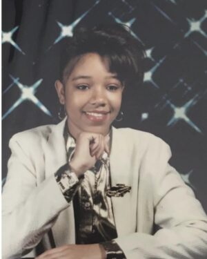 Chrystee Pharris Instagram - Let's dissect this pic. 10th grade. 90's. Clueless about hair, so it's a mess. Channeling Michael's baby hair look from the 80's, LOL! My hair was way too long for that nonsense, and I had no idea what I was doing. Hence, my distaste for the baby hair look today! I have my mom’s clothes on. Not sure why I thought that car pin would look cool in a school picture. But it was gold! The only thing that’s winning is the 16 year old innocent smile. 🥰
