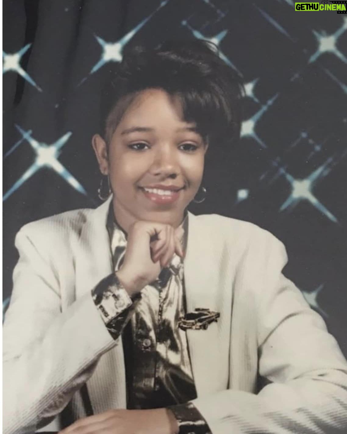 Chrystee Pharris - 3 Likes - Let's dissect this pic. 10th grade. 90's. Clueless about hair, so it's a mess. Channeling Michael's baby hair look from the 80's, LOL! My hair was way too long for that nonsense, and I had no idea what I was doing. Hence, my distaste for the baby hair look today! I have my mom’s clothes on. Not sure why I thought that car pin would look cool in a school picture. But it was gold! The only thing that’s winning is the 16 year old innocent smile. 🥰