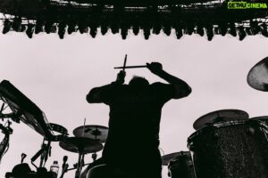 Chuck Comeau  Instagram - B&W vibes from our last European tour! 🤩

📸: @shotbywozniak
