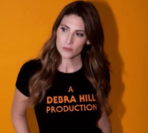 Clarke Wolfe Instagram - 📣 I am so excited this announcement has been made and incredibly honored to be a small part of it! Directors Margaret McGoldrick and Jim McMorrow and EP @kerry.roy have been at this labor of love for so long and it meant so much to sit and talk about what Debra’s legacy has meant to me.

In July 2018 at the SDCC press line for #HALLOWEEN after getting the band back together for a new installment 40 years after the original changed movies forever, I was told things were running behind and I had time for one question so I asked @jamieleecurtis what she thought Debra Hill would think of all of the excitement because frankly, I felt like her name had been left out of the bigger conversation up until that point. Jamie smiled and shared stories, we shared tears and a hug (you can watch the video on the fourth slide!) and it is truly one of the biggest highlights of my career. Soon through these wonderful filmmakers’ determination and passion, the world will hear more of Debra’s story. It’s about damn time. 🧡🖤🧡 

#halloween #horror #screamqueen #slasher #fandom #womeninfilm #womeninhorror #debrahill
