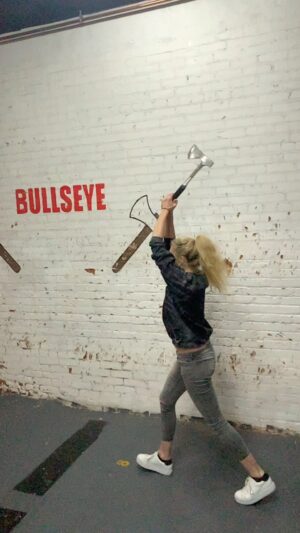 Claudia Black Instagram - Activities for single mums with teen boys in what I call ‘A Turducken of Trauma’ aka war, a pandemic, climate crisis, the rise of fascism…I could go on. What I chose this weekend was a break/rage room and axe throwing. And it was awesome. Active engagement with our inner wild ones, our fears and frustrations and the visceral satisfaction of breaking things whilst doing no harm to anyone. It was perfect shadow work. I don’t know why the axe throwing felt like second nature to me. I had such alignment with it that as the axe left my hands each time I knew in my body with 99.99% surety whether it would hit the target or not. It was a surprising clarity. An almost startling quality of presence. I wondered if that’s what athletes feel when they are in flow. Except they’ve trained. They’ve practiced. Their whole lives. This was my first time doing the thing. Are the inbuilt physics of axe throwing so specific and innate that when you’re on it’s a completely embodied knowing? Or was I a Viking in a past life? Do I now need to attend Ren fairs? Is axe throwing an Olympic sport???